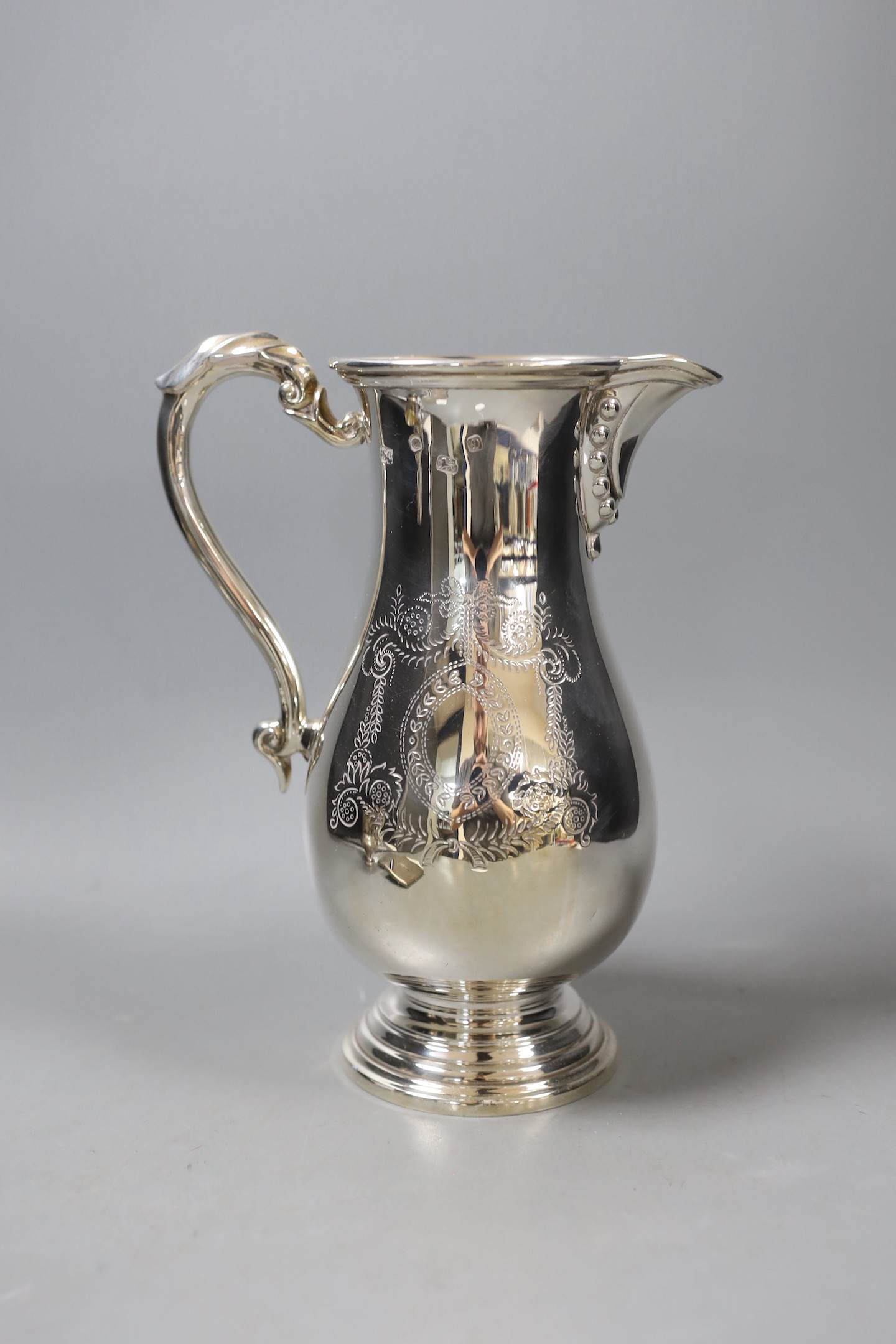 A modern engraved silver water jug, maker, SC, Sheffield, 1971, height 23.8cm